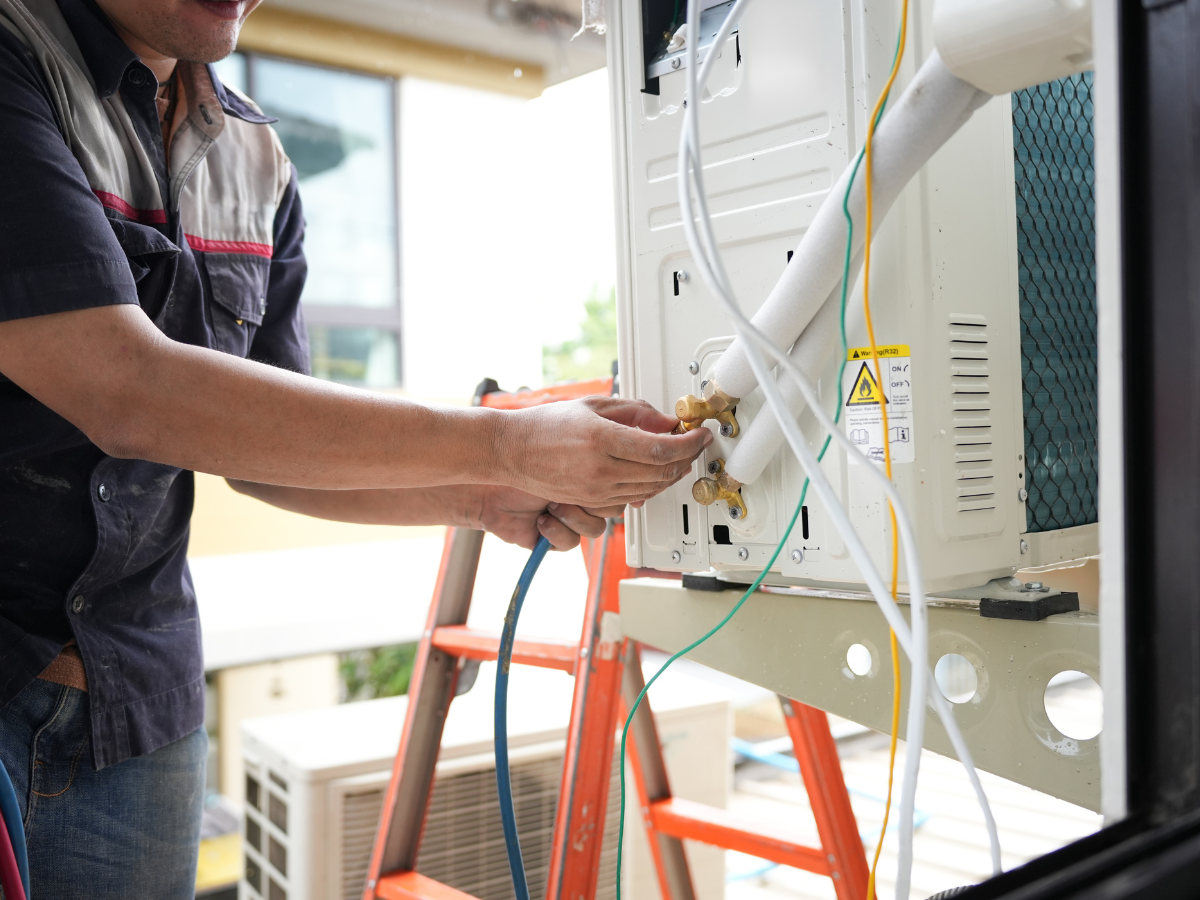 A McCandless Plumbing & Excavation technician works carefully, showing the precision needed for expert sewer repair jobs.