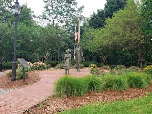 McCandless Plumbing & Excavation shows care for the land, with clean paths and preserved garden areas in a peaceful setting.