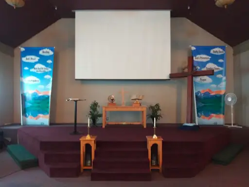 A clean church stage shows how McCandless Plumbing & Excavation prepares spaces for events or septic system checks.