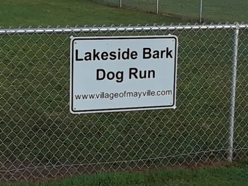 A sign by McCandless Plumbing & Excavation points out a place where locals get help with excavation or septic needs.