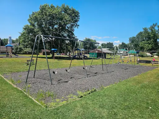 McCandless Plumbing & Excavation works quietly as families enjoy the peaceful playground without disruption.