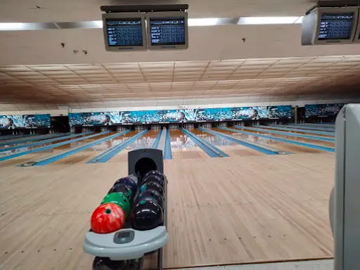 Bowling alley fun shown as a way McCandless Plumbing & Excavation team unwinds after a day&rsquo;s work.