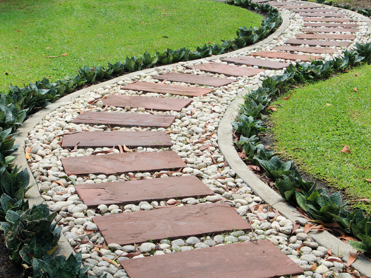 McCandless Plumbing & Excavation shows a neat, relaxing garden area, ideal for enjoying after septic system service.