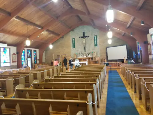 McCandless Plumbing & Excavation presentation screen set up in a church, ready for a sewer camera inspection demo.