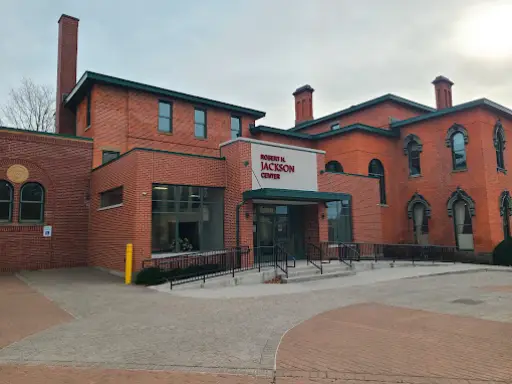 McCandless Plumbing & Excavation&rsquo;s building shows a place for learning about septic inspections and plumbing services.