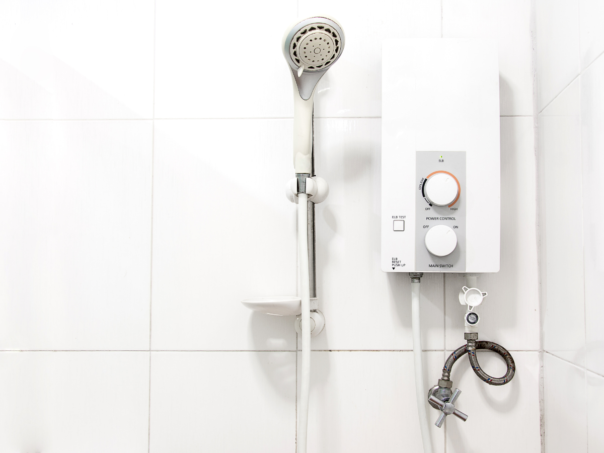 A clean electric shower unit by McCandless Plumbing & Excavation, showing a smart choice for bathroom upgrades and water needs.